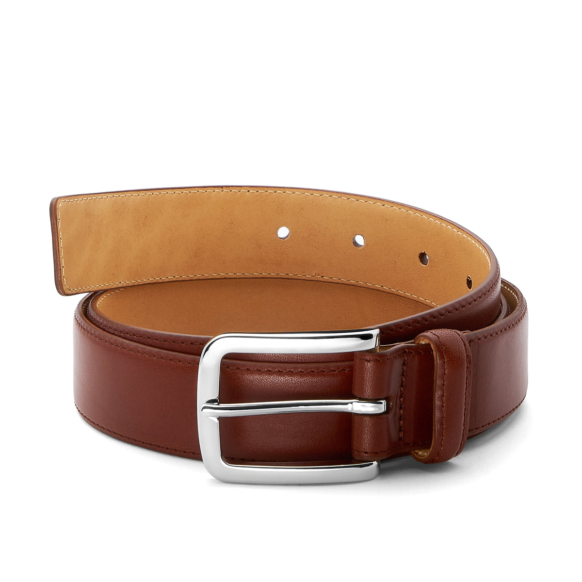 leichter Herrengürtel zum Anzug, schmal und elegant. Hochwertiges Leder in Cognac mit Silberschnalle. Das Modell ist bombiert und genäht.